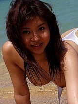 A Sexy Japanese Babe With Perky Tits Gets Naked And Bathes In The Cool Ocean Water. 10