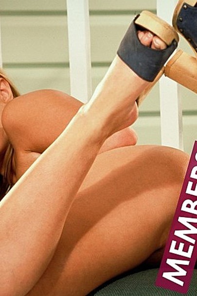 Nina undresses on her porch 08