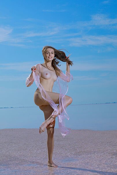 Elle Tan In Tranquil Ocean Beach Scene 07