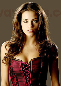 Hot brunette Jenna poses for camera