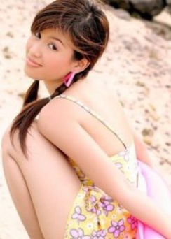 Sexy Katie Chung unveils her curves on the beach